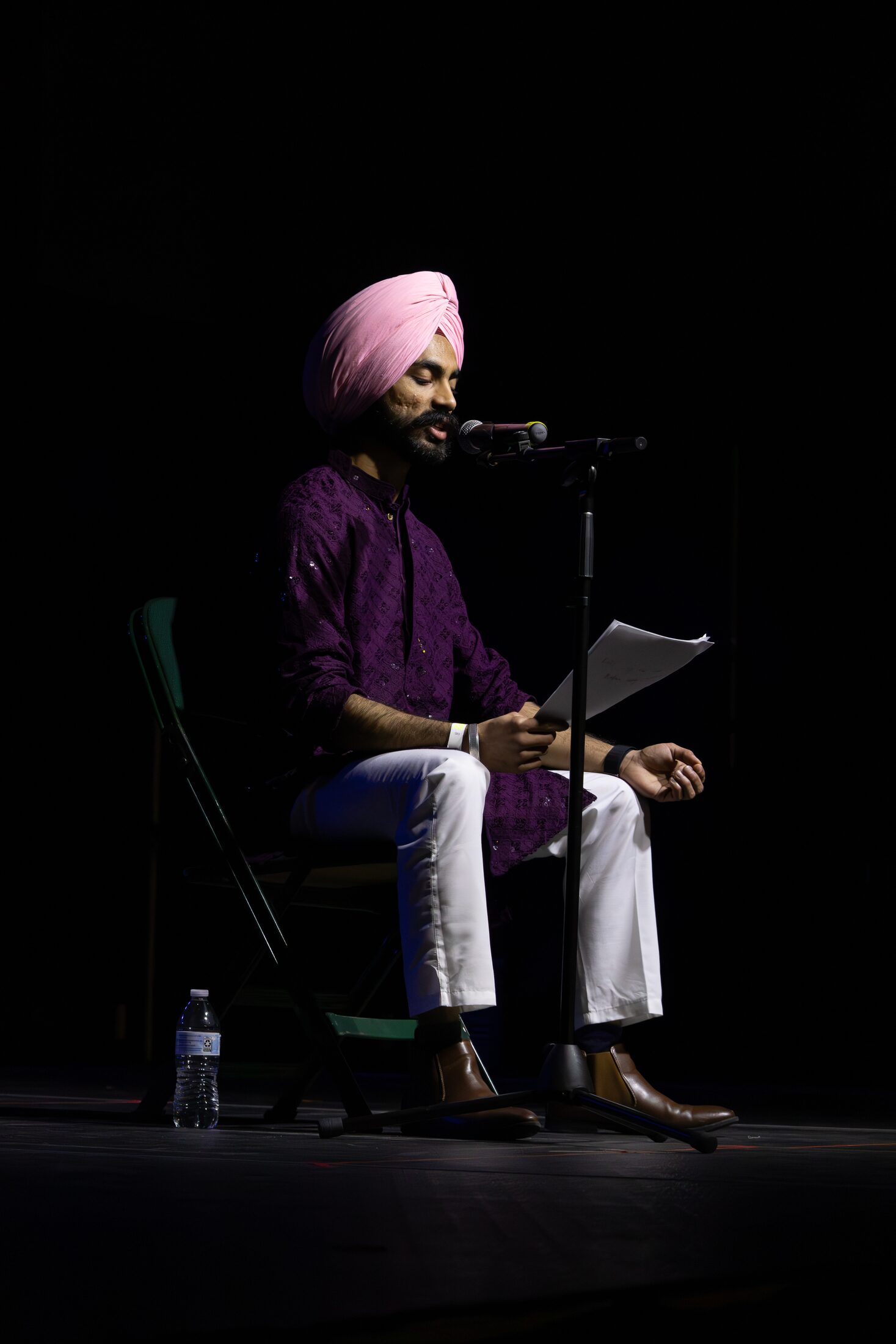 Speaker presenting during a cultural event